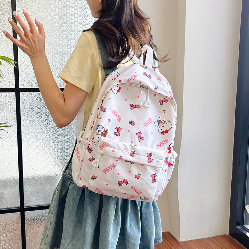 Bolsas escolares de estilo nuevo al por mayor para hombres y mujeres, estudiantes de secundaria y preparatoria, mochilas de gran capacidad para viajes de ocio, mochilas al aire libre