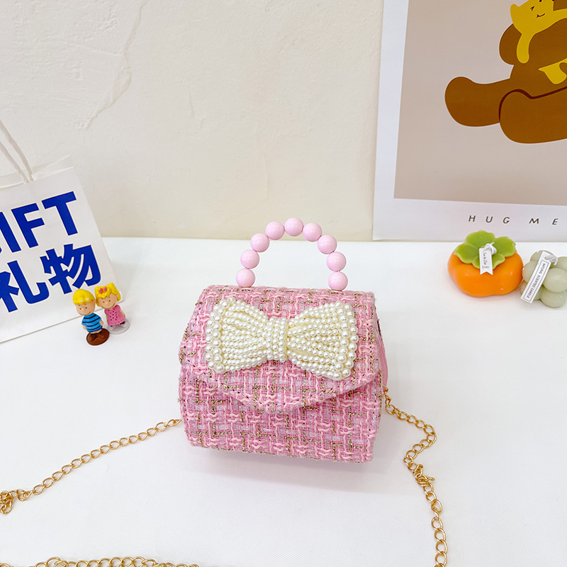 2022 nuevo arco de la celebridad en línea tejida bolso de los niños de las mujeres de estilo coreano lindo crossbody mini bolso de la perla