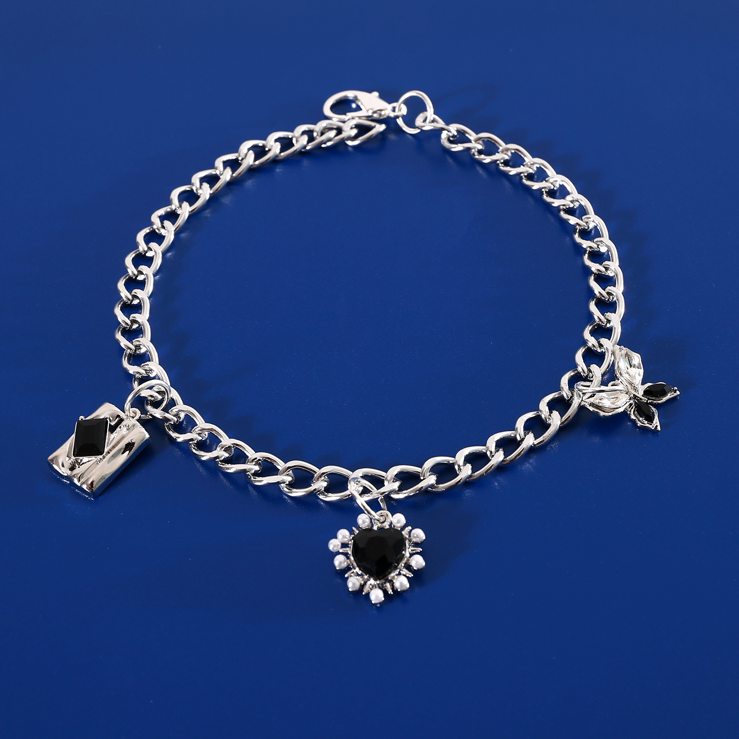 Comercio exterior mascotas collar de metal gemas amor arco colgante de zircon viento dulce gato perro collar de plata