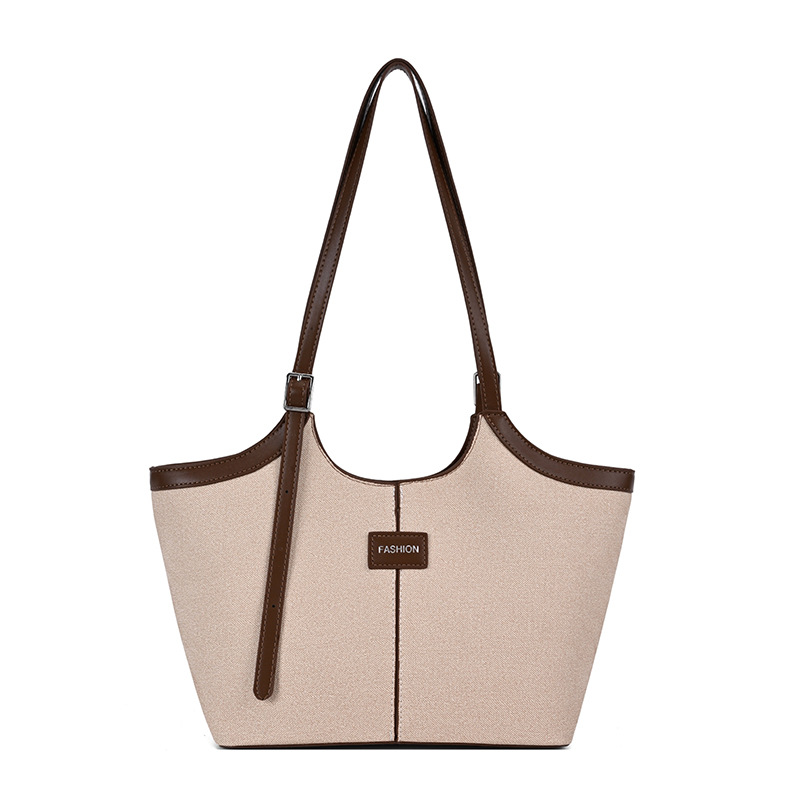 Bolsa de mano retrógrada de nicho para mujeres 2026 comercio exterior nuevo color de choque de alta calidad bolso de hombro de gran capacidad