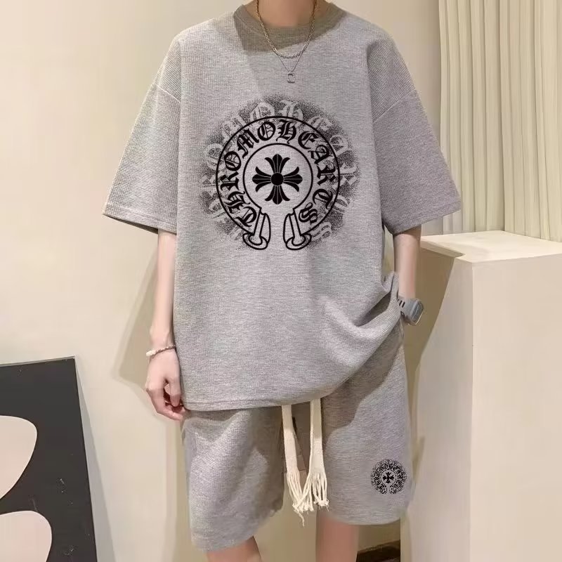 New summer men's waffle knit tracksuit, a trendy streetwear brand, featuring a two-piece set of short-sleeved shirts and shorts perfect for teenagers.