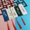 Boxed with 30 pieces in the future + red ribbon + tassels