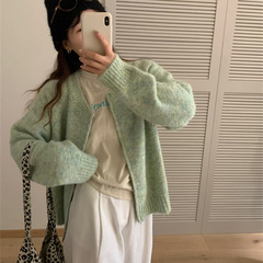ミルクのフフの花の線の丸首のセーターのコートの女性の秋冬の新型の韓系の優しい怠惰な風のファスナーのニットのカーディガンの潮