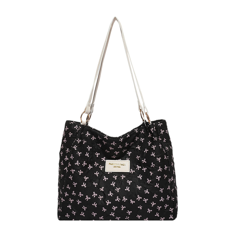 Bolso de tote 2025, primavera y verano, nuevo tipo de bolso de hombro, moda, bolso de mano, bolso de viaje de estilo extranjero para mujeres.