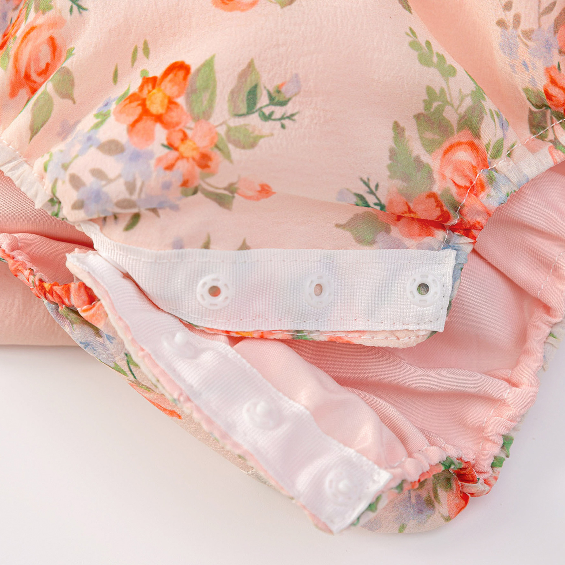 Europa y América de moda para bebés, jaqueta de burbuja impresa, muñecos de descarga de bolsas de triángulo, ropa de trepa para bebés recién nacidos