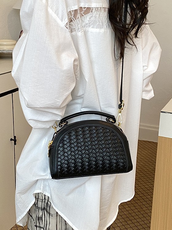 Fábrica de fuente al por mayor bolso semicircular leopardo mujer 2026 nuevo tejido empalme de alta calidad bolso de hombro