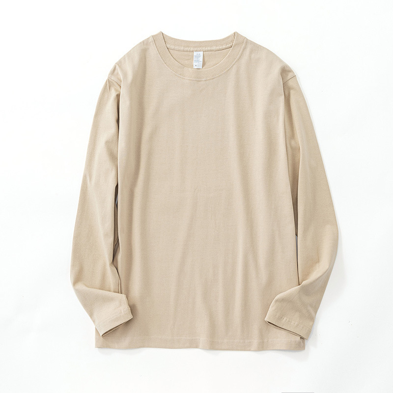 Algodón suelto cuello redondo camiseta de manga larga hombres y mujeres del mismo color sólido simple todo partido top se puede usar fuera de la camisa de fondo