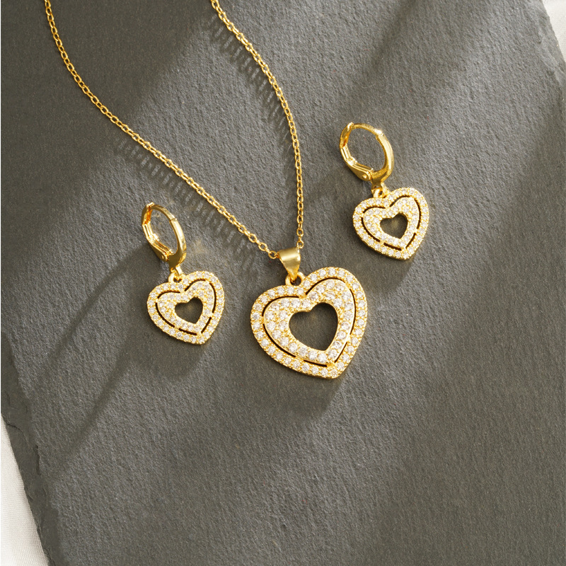 Collar de oro de arena transfronterizo de lujo ligero con doble línea de corazón pendientes para mujeres, joyas que no se desvanecen
