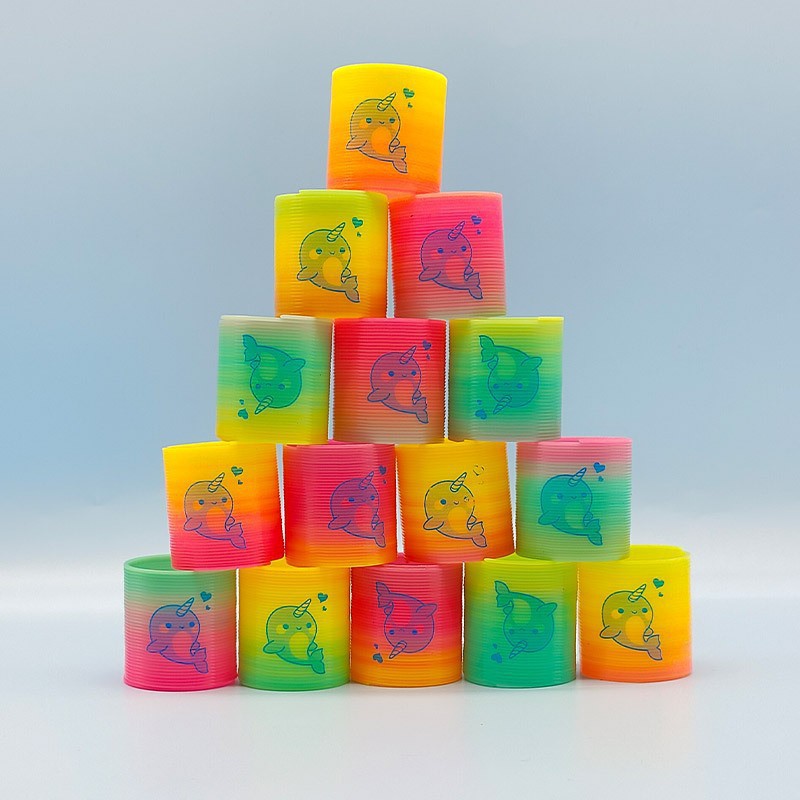 Regalo de trompeta de anillo de primavera de venta caliente transfronteriza, rompecabezas, nostalgia, sonrisas sonrientes apiladas, música mágica círculo del arco iris