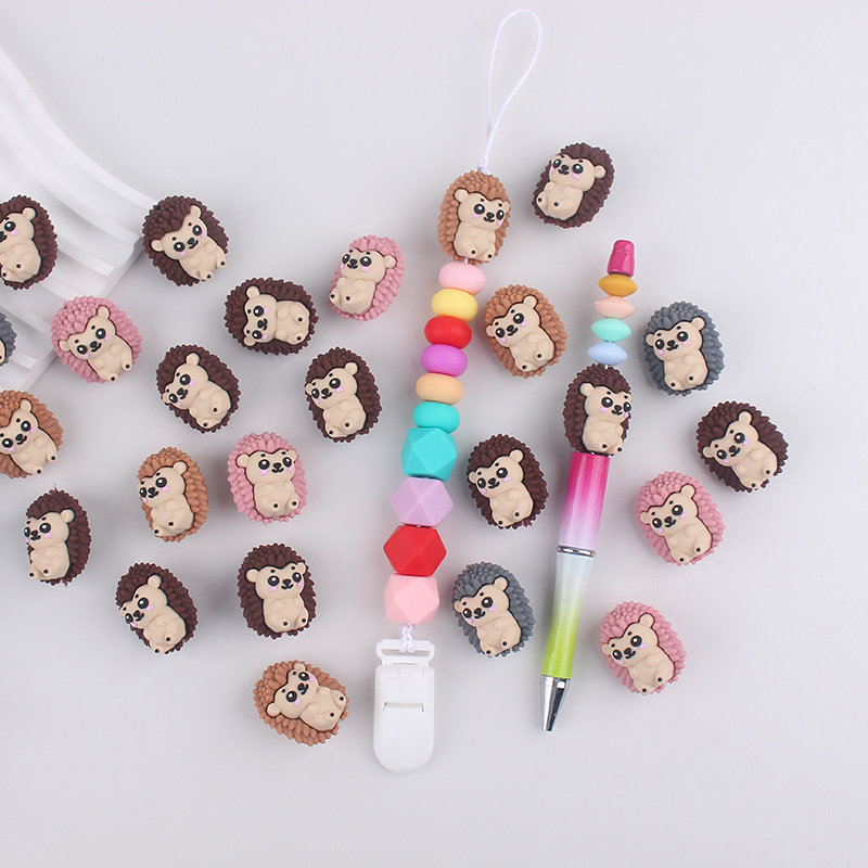 Nuevo erizo cuentas de silicona cuentas lindas de silicona de dibujos animados bolígrafo de cuentas de bricolaje mordedor para niños cadena anti-caída cuentas