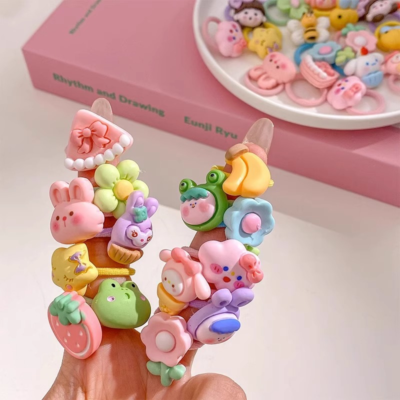 Los niños de la banda del pelo del bebé de la historieta no lastiman la banda de goma del pelo de la niña volumen del pelo menos cuerda del pelo del bebé