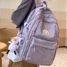 双肩包女2025新款书包小学初中生大容量百搭轻便高中减负背包男