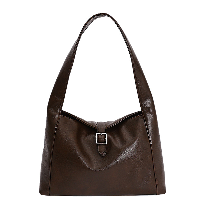 Luz de lujo retro cuero suave bolsas de brazo mujeres otoño / invierno 2025 nueva gran capacidad simple bolsas de hombro bolsas de mano