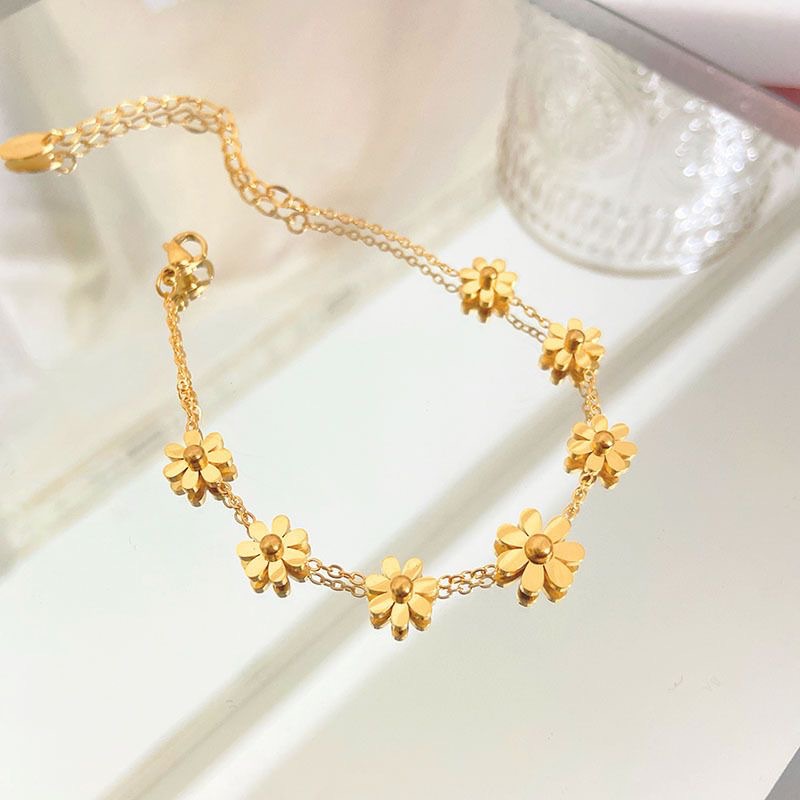 2022 nuevo oro pequeño Zou Ju tobillera ajustable japonés y coreano hembra titanio acero nicho siete flor tobillera hembra