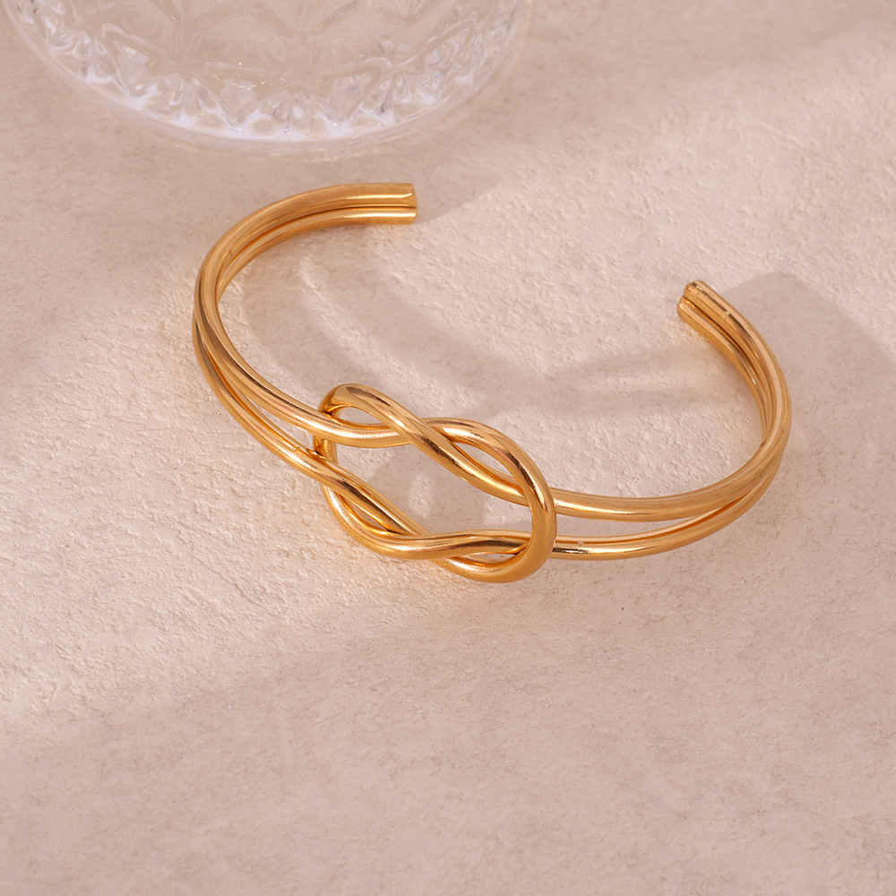 Brazalete de acero inoxidable transfronterizo de 18K personalidad exagerada simple anudado abierto pulsera de acero inoxidable INS todo fósforo venta caliente