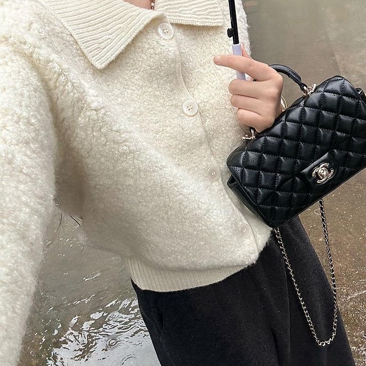 复古学院慵懒风超好看的白色翻领别致设计软糯毛衣女2025秋季新款