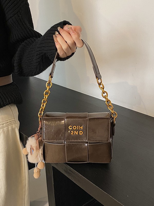 Bolso tejido de cuero de cera de aceite de alta calidad para mujer 2025 primavera nueva moda casual bandolera de moda de nicho