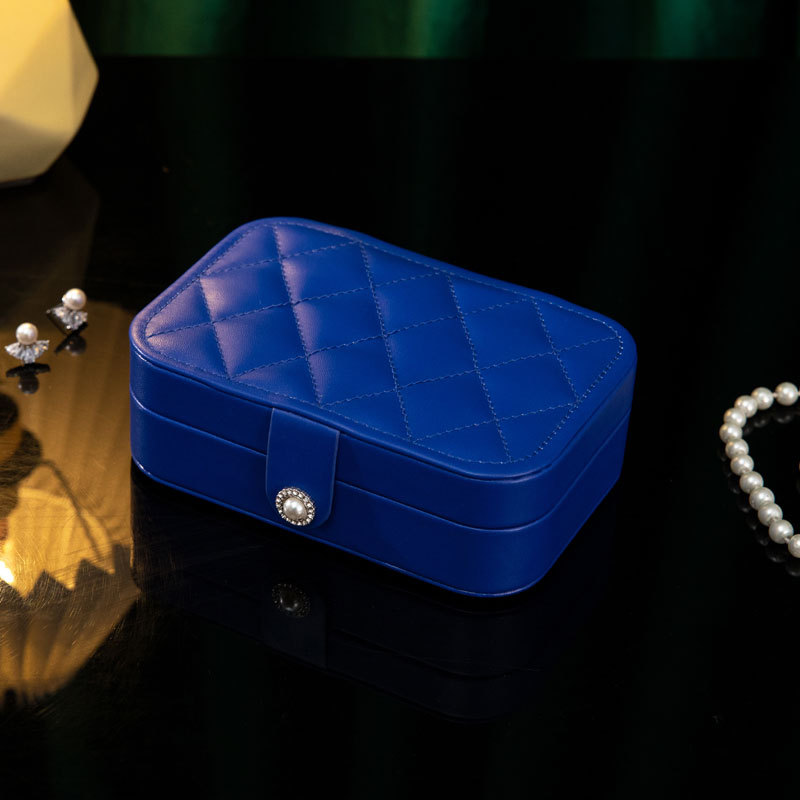 Nueva caja de joyería portátil de lujo ligero caja de joyería de estilo europeo y americano de alta gama de moda de alta calidad PU caja de almacenamiento de joyería transfronteriza