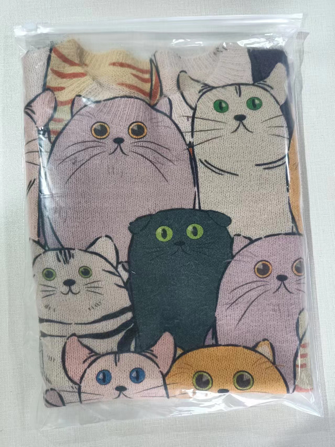 Otoño y invierno suéter de tamaño grande patrón de dibujos animados chaqueta suelta perezosa gato de moda de punto de cuello redondo medio largo image 4