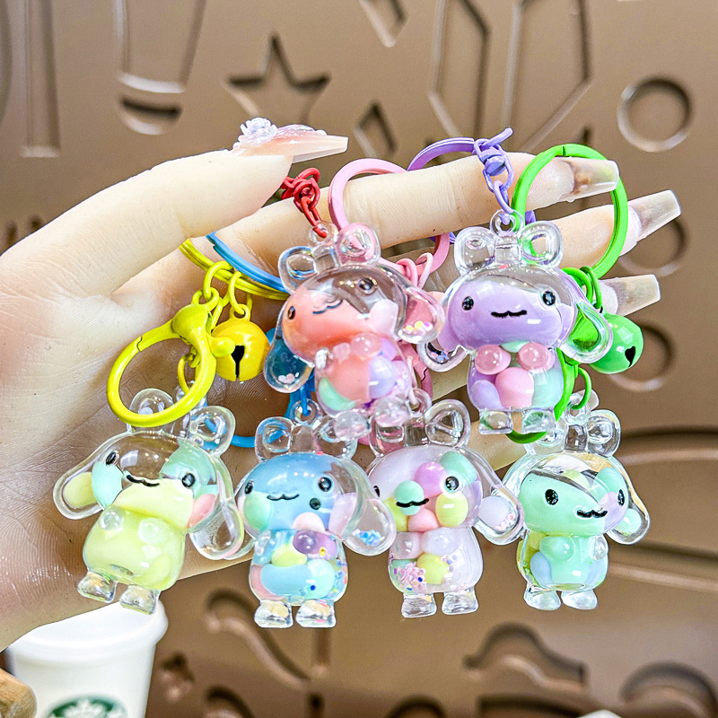 Caricatura creativa adorable acrílico frijoles de azúcar fluir arena jade Gui perro llavero colgante adornos puestos de productos al por mayor