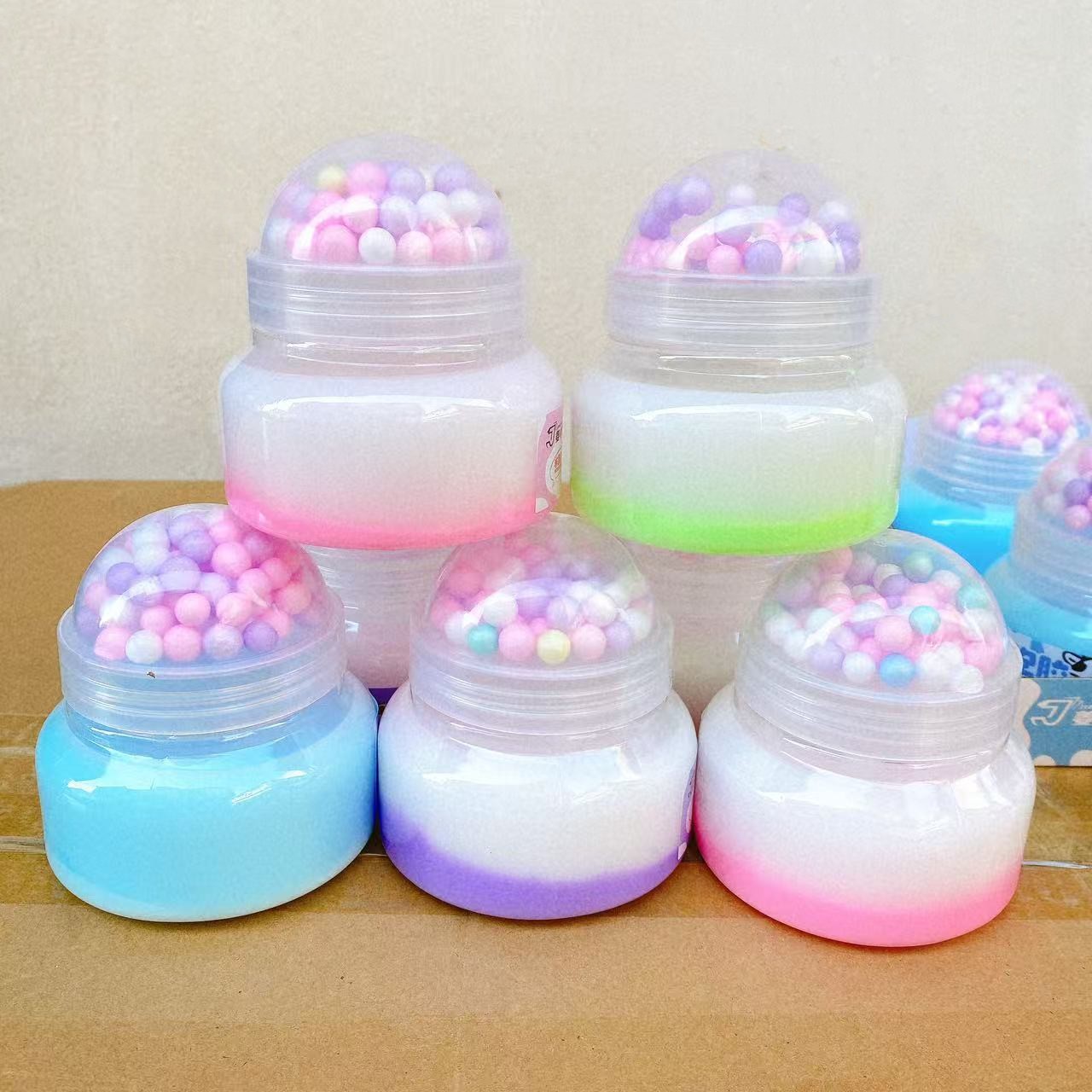 Juguetes de descompresión de dos colores cinta espumosa perlas de color puzzle slime barro de cristal barro de color alta permeabilidad al por mayor 2 yuanes