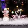 Luxurious pink swan + pink and white diamond-encrusted balloon bottle + feather cushion