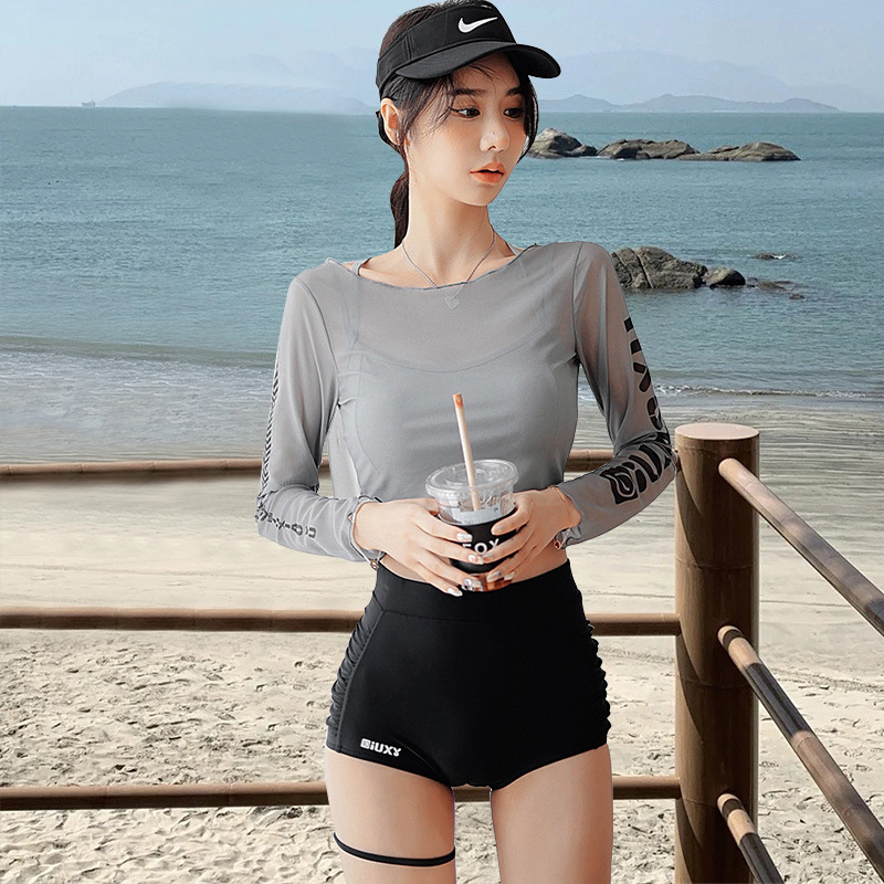 2025 nuevo trajes de baño de mujer de color sólido sexy de tres piezas para cubrir la piel delgada de mangas largas trajes de baño deportivos de protección solar