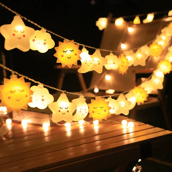 Stars + clouds + sun + moon (warm light)