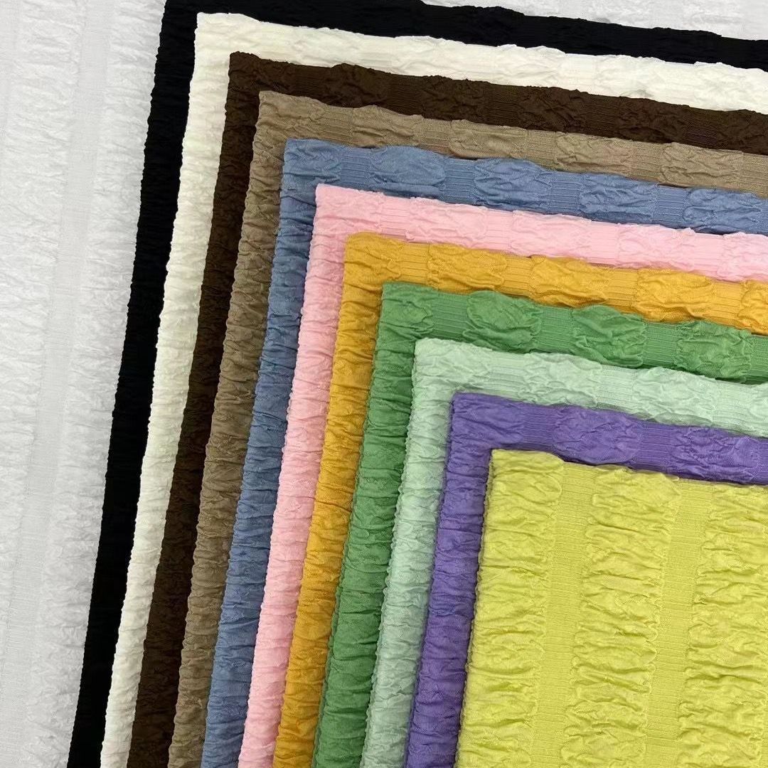 秋冬款针织提花布肌理针织面料曲条皱皱布提花布料针织布料梭织布