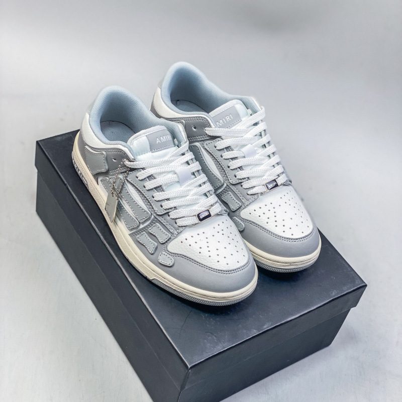 Putian de alta calidad AMIRI hueso zapatos de lujo ligero para hombres y mujeres zapatos de skate de suela gruesa de moda zapatos de skate casuales para mujeres zapatos de moda