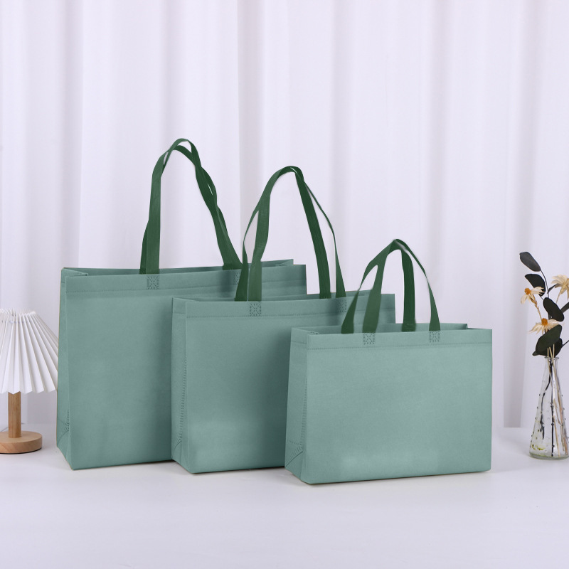 Bolsas de compras no tejidas gruesas para tiendas de ropa, bolsas de embalaje de regalo ecológicas laminadas personalizadas, bolsas de mano no tejidas