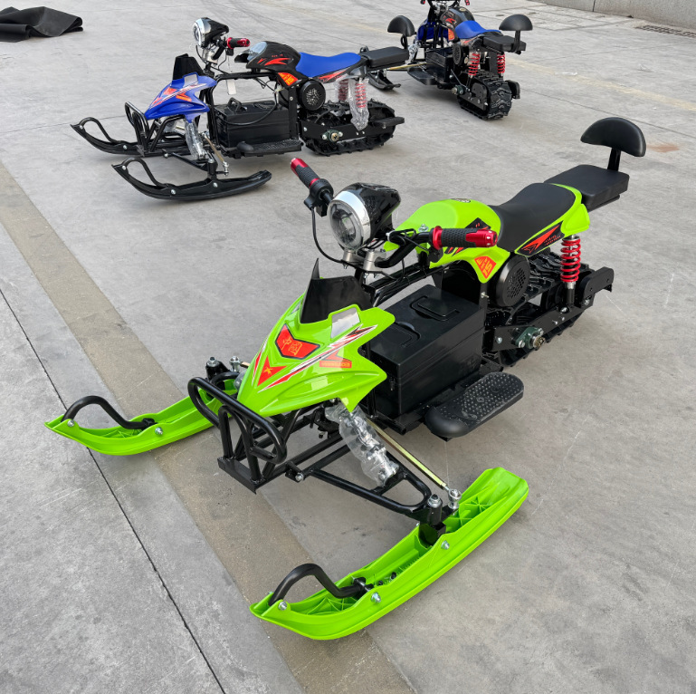 Electric snowmobile with anti-slip tracks, wheeled ski vehicle for adults and children, snowboard sled for ice and snow recreation Electric snowmobile with anti-slip tracks, wheeled ski vehicle for adults and children, snowboard sled for ice and snow recreation