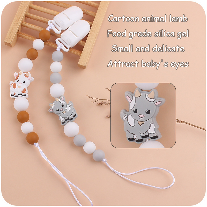 Nuevo bebé suministros chupete cadena creativa de dibujos animados Cordero silicona bebé mordedura cadena anti-gota molar