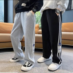韓国版男児春秋タイプの衛ズボンの中の大きい子供のズボン2023子供の運動のストレートズボンの潮流の3バーのズボンの潮