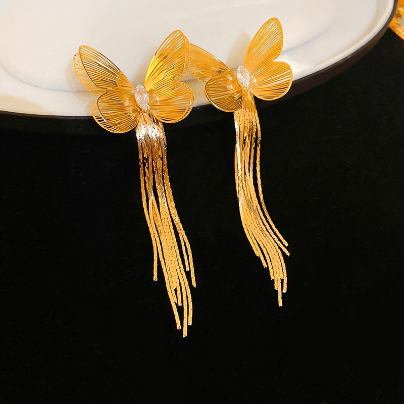 Pendientes de borla de hoja de circón largo de viento de metal con aguja de plata Pendientes de moda exquisita Pendientes de lujo ligero de viento frío