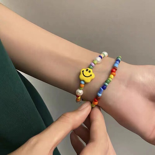 New colored beaded smiley bracelet for women ins niche design student best friend elastic rope bracelet for fashionable dopamine