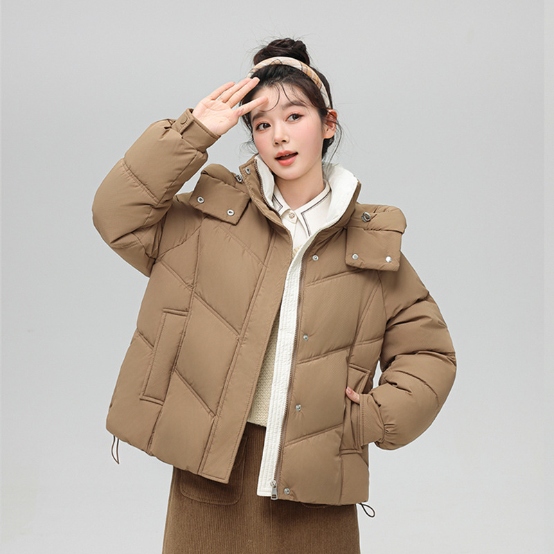 Algodón mujer 2025 otoño y invierno nuevo estilo coreano corto engrosado plumón chaqueta de algodón pequeño suelto chaqueta con capuzas de color contraste