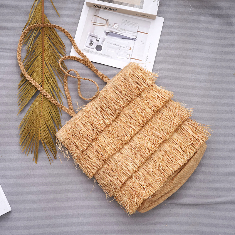 Large capacity straw bag portable ins niche vacation photography crossbody woven bag female summer new mummy bag