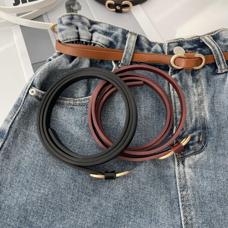 Cinturón fino de las nuevas mujeres camisa de vestir de la moda de las mujeres todo-fósforo Punch-libre pu pequeño cinturón estilo coreano pantalones cinturón color sólido