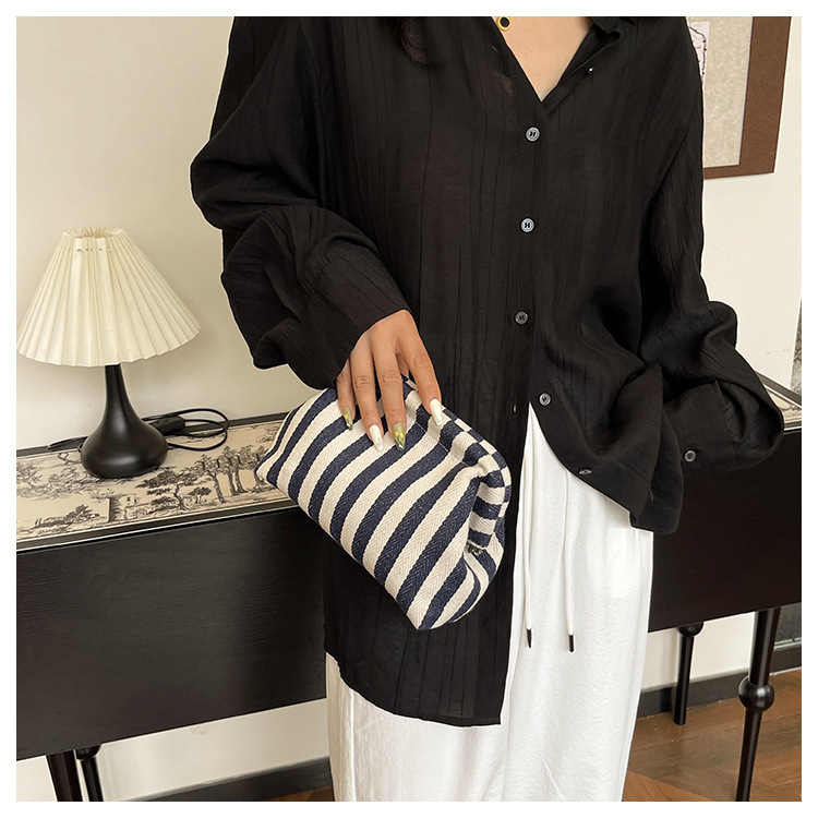 New cross-border fashion color-blocking striped cosmetic bag, women's loose change mobile phone storage bag, trendy and niche cloud clutch undefined