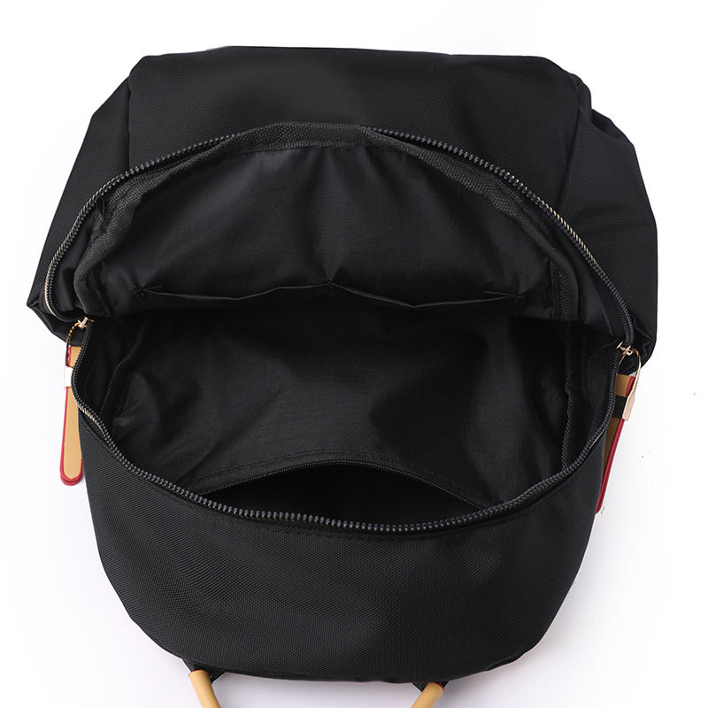 2023 nueva mochila de nailon para mujer de color de contraste moda simple de gran capacidad mochila de viaje al aire libre mochila escolar al por mayor