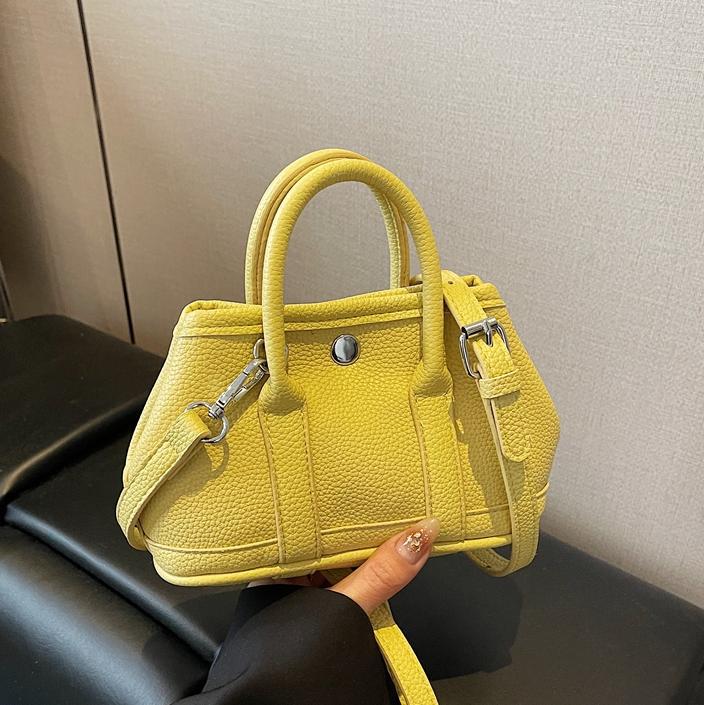 Bolsa de cubo de mano popular de verano para mujeres 2025 nuevo bolso de hombro super caliente universal nicho super caliente mochila