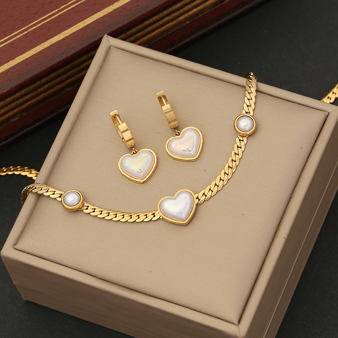 Collana con cuore di perla e set di gioielli in acciaio oro_voghion.com