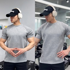 春夏男性重ポンドは半袖の抗シワ高弾をつなぎ合わせています。