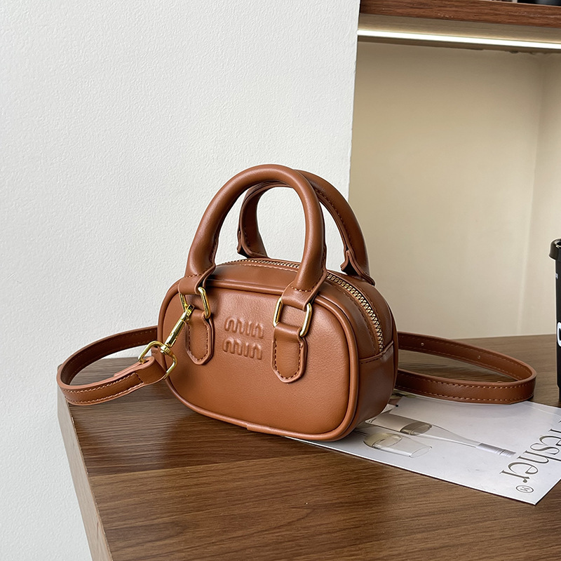 2024 otoño y invierno nuevo retro mini niñas documentos portátiles para padres e hijos accesorios bolsos pequeños bolsos de mujer