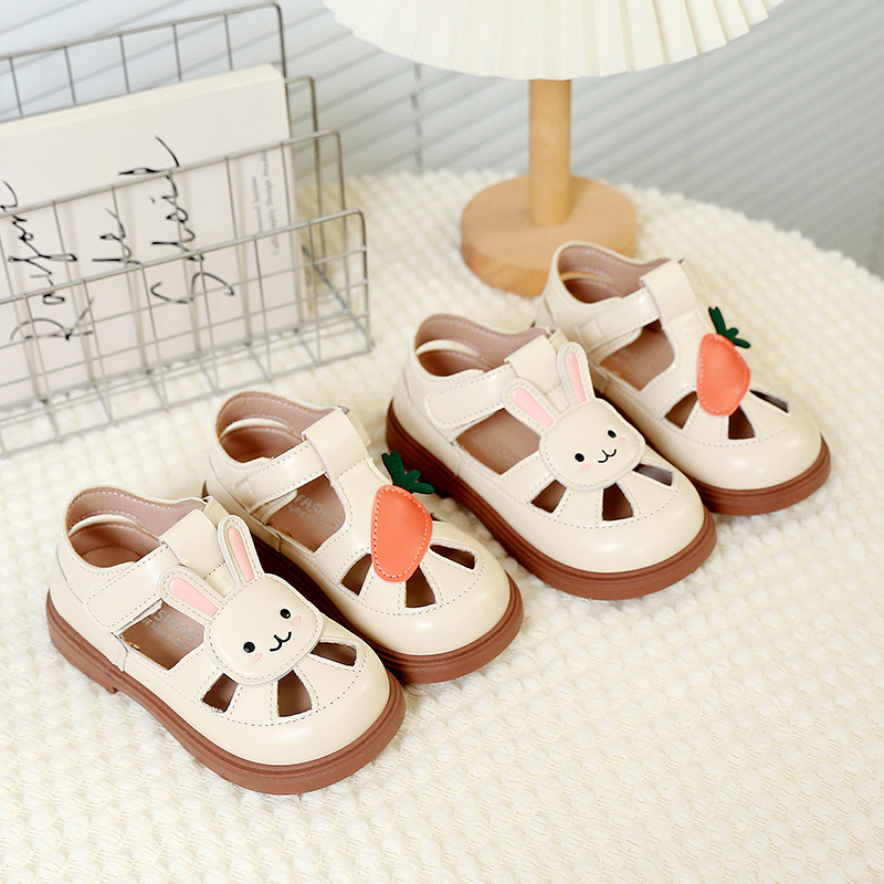 Niñas de dibujos animados conejo Baotou sandalias 2025 verano nuevo estilo niños estilo occidental princesa zapatos de cuero hueco para niñas marea