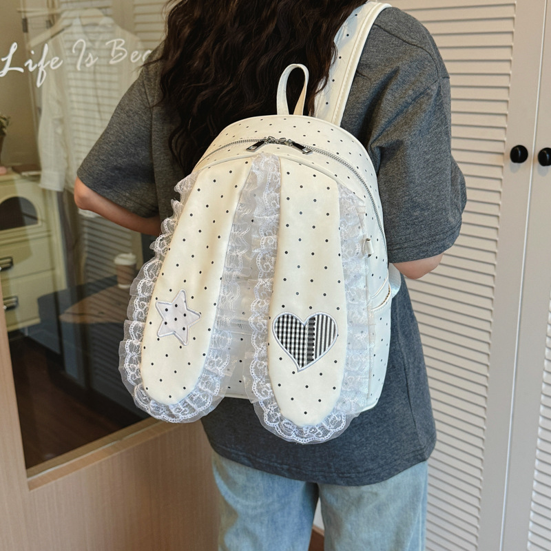 2026 nuevo punto de onda oreja de conejo mochila de moda mujer bolso de hombro universal portátil ligero bolso de encaje dulce
