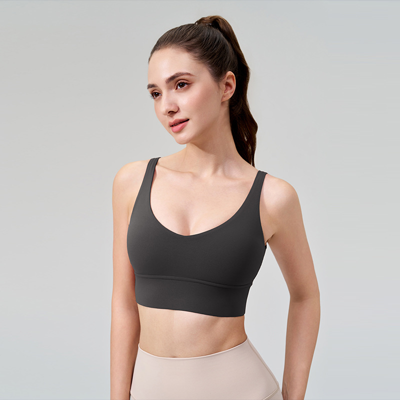 La nueva ropa interior deportiva a prueba de golpes transfronteriza para mujeres se reúne profundamente V fitness hermosa espalda desnuda con almohadilla para el pecho sujetador de yoga sin costuras