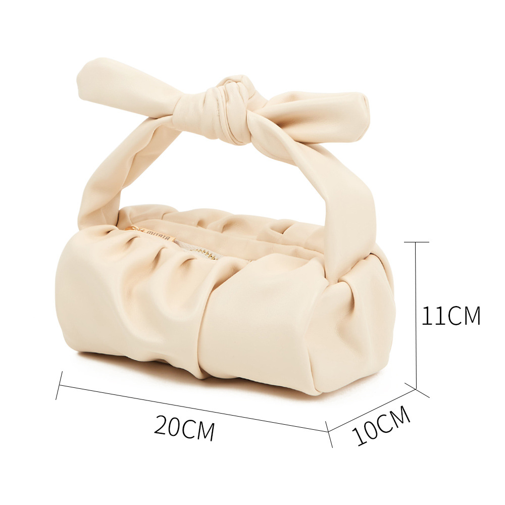 2022 verano nuevo casual portátil plisado bolsa de nicho diseño de las mujeres bolsa de Internet celebridad PU material todo partido nube bolsa