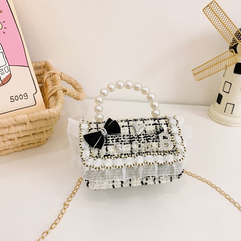 2025 nuevo estilo coreano de viento de fragancia mini niñas princesa de perlas portátil hombro único accesorios bolsos para niñas
